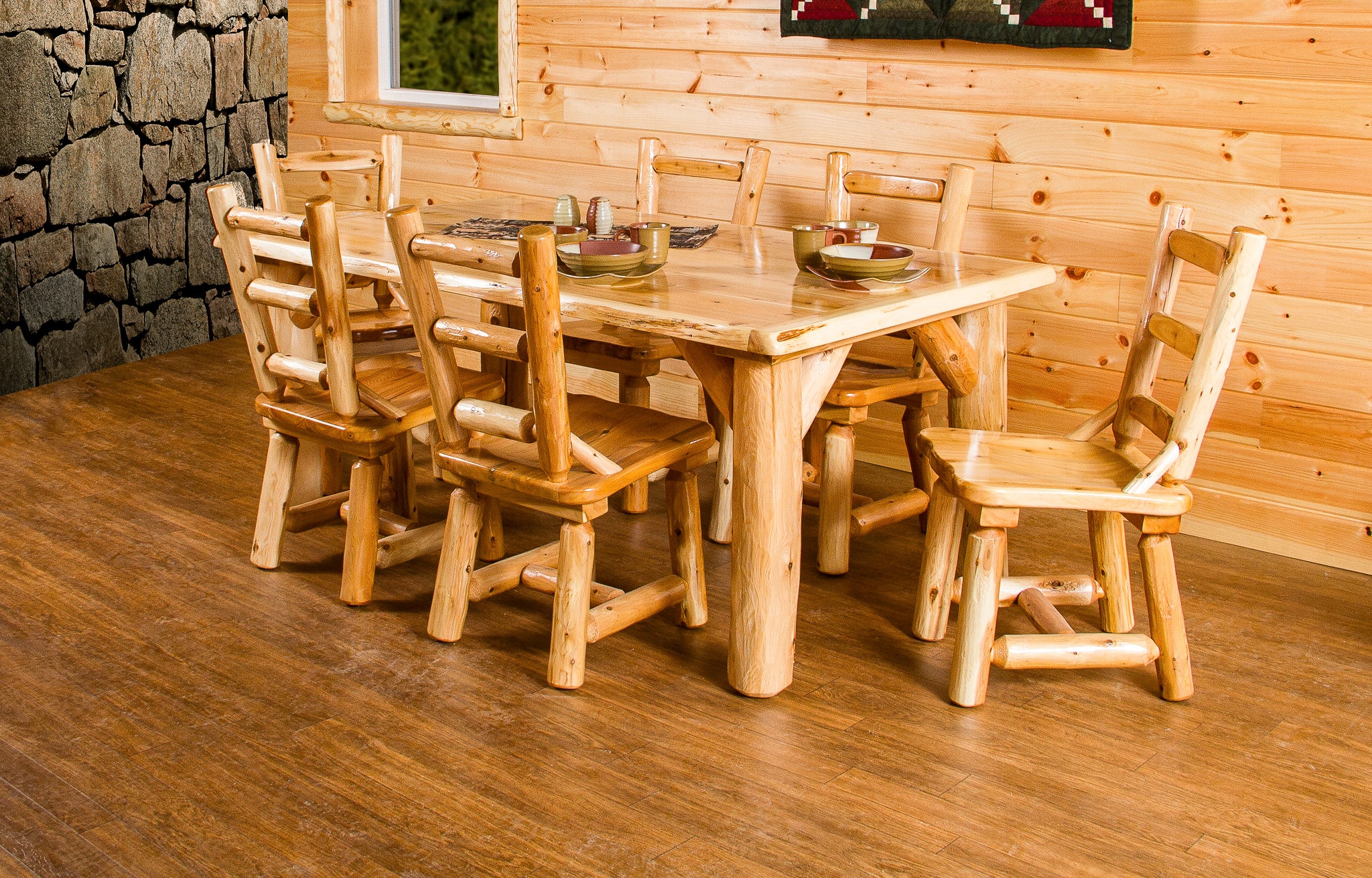 How to care for wood furniture image - polished sturdy white cedar table with six matching chairs - set in room with brown wood floor light wood wall and stone side wall
